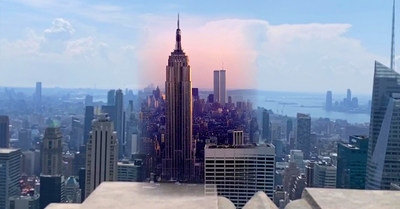 From Rockefeller Center's "Top of the Rock" observation deck, augmented reality reveals a bird's eye view of yesteryear as the World Trade Center's twin towers stand tall in the setting sun.