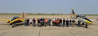 The test team with the two MQM-178 Firejets and the L-39 and L-29 chase aircraft.